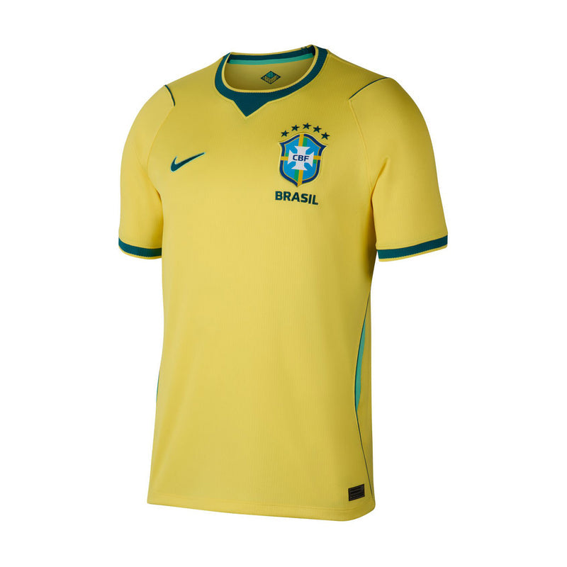 Front-facing yellow Brazil home soccer jersey with teal trim, CBF crest, stars