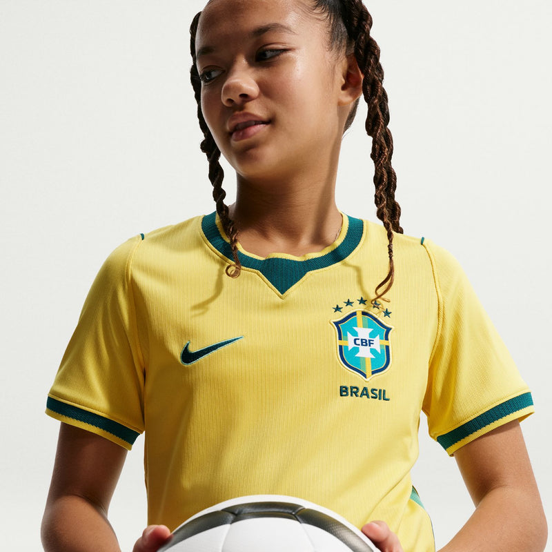 Youth Brazil home soccer jersey with teal collar trim, Nike swoosh, and CBF crest