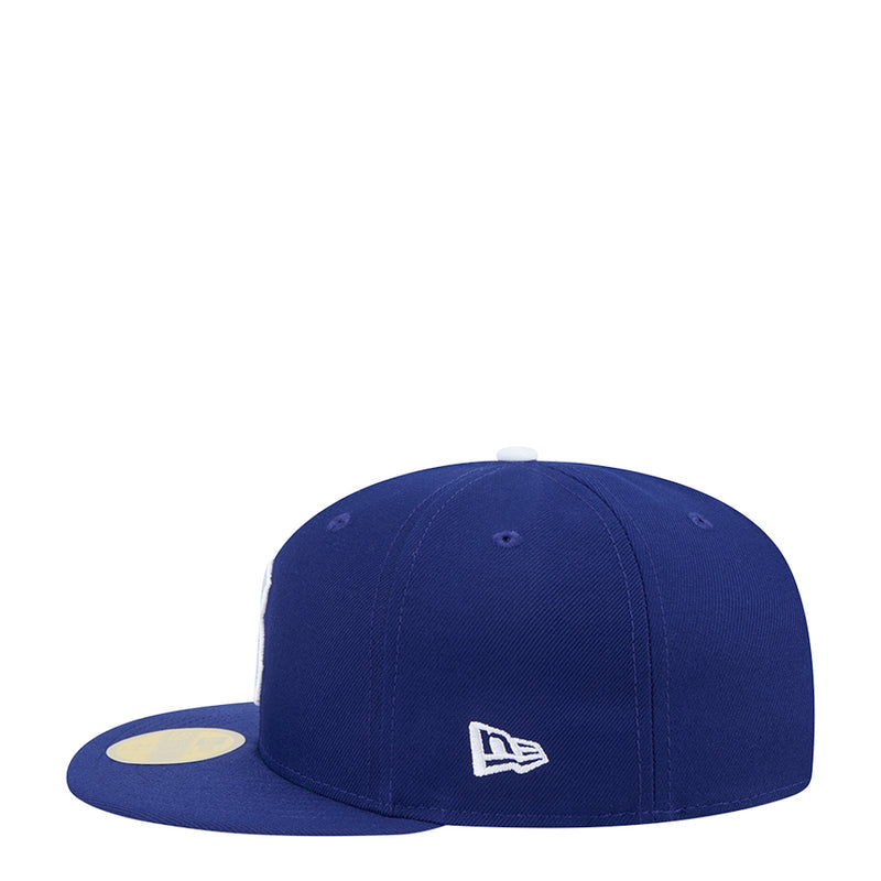 Blue baseball cap with New Era side logo
