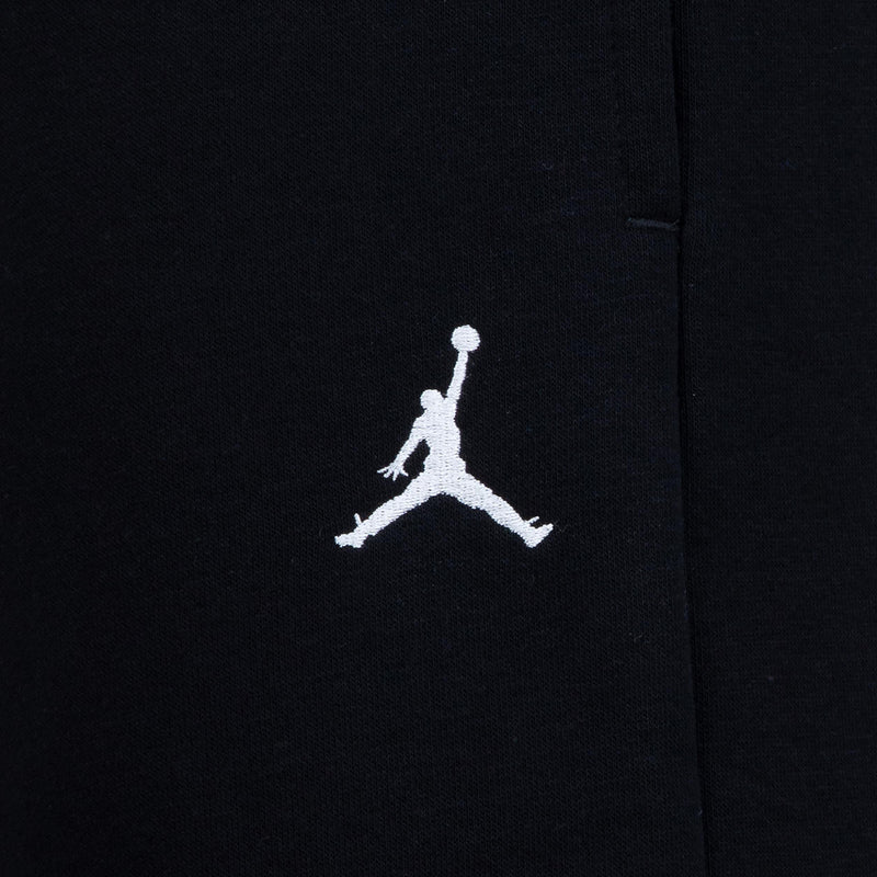 Black fleece pant fabric with white Jumpman logo detail