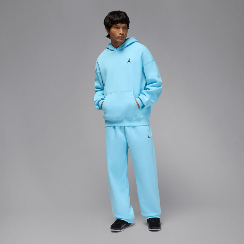 Men's light blue oversized pullover hoodie with drawstring hood and chest logo