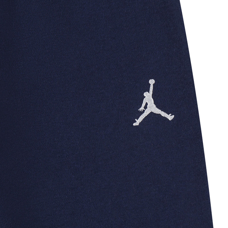 Navy toddler jogger leg with white Jordan logo embroidery on fleece