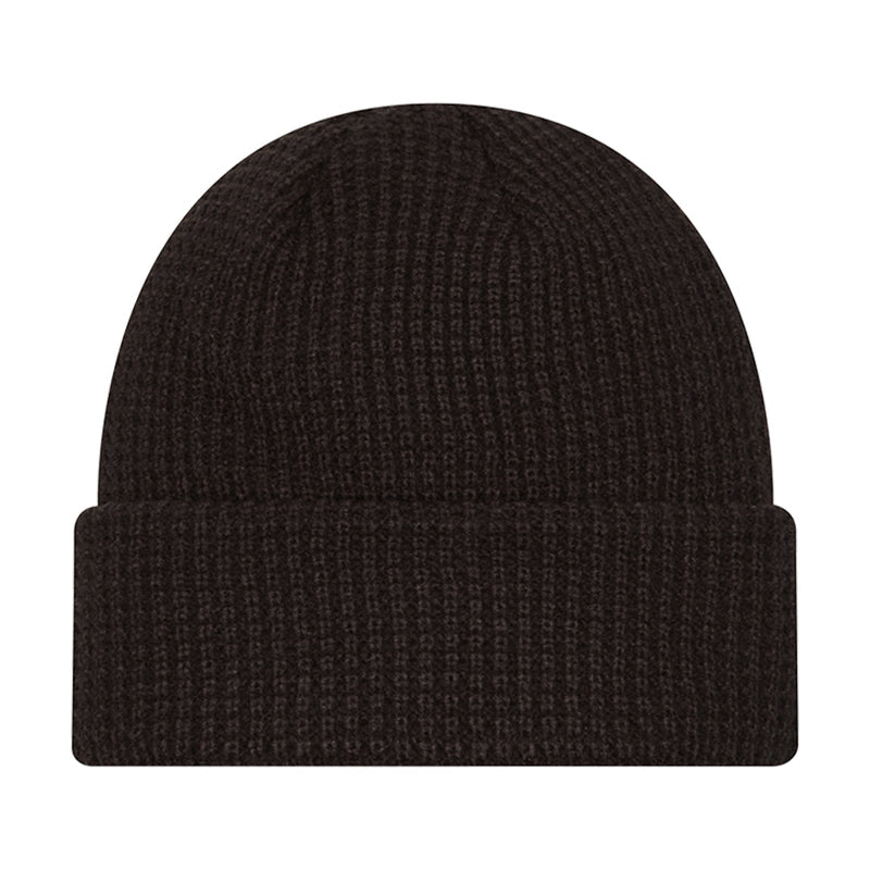 Dark knit waffle beanie with folded cuff, no visible logo