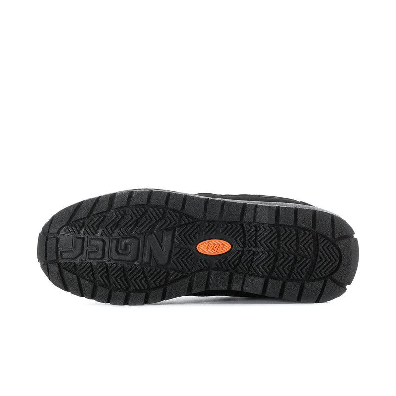 Men's black sneaker outsole with deep tread pattern and orange logo patch