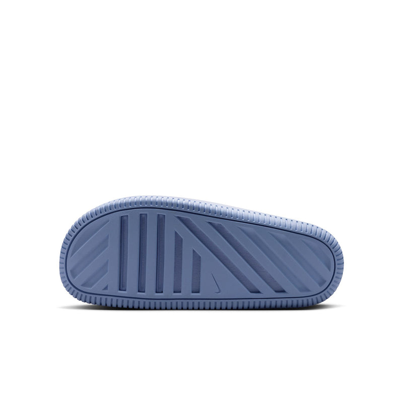 Light blue youth slide sandal outsole with textured tread and heel support