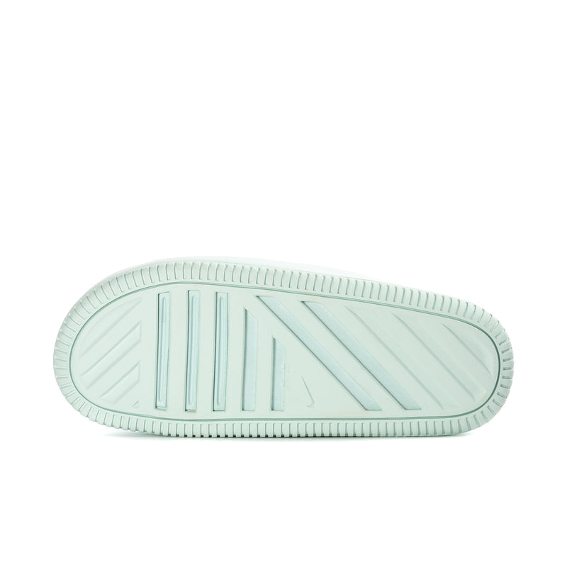 Mint slide sandal outsole with textured traction grooves and pattern