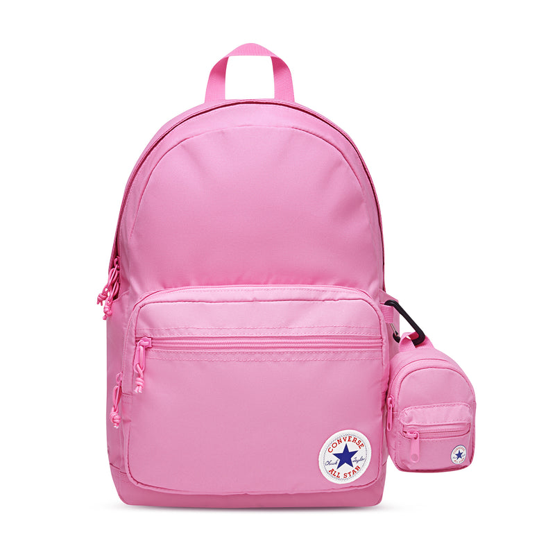 Oops Pink mini backpack with top handle, zip front pocket, and side storage pouch