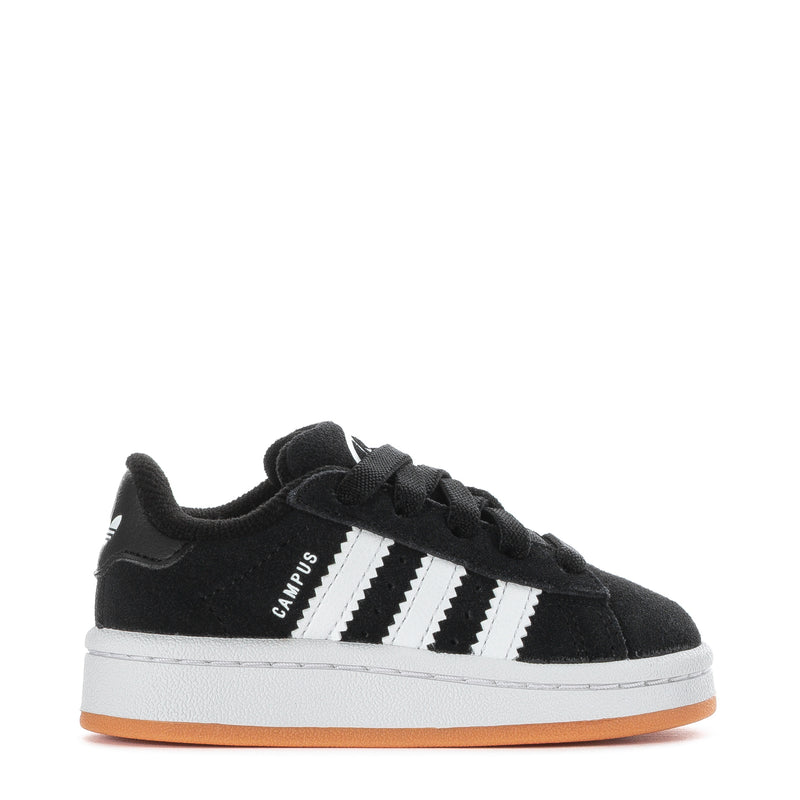 Toddler black suede sneakers with white adidas-style stripes and gum rubber sole