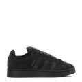 Youth black low-top sneakers with black laces and three side stripes