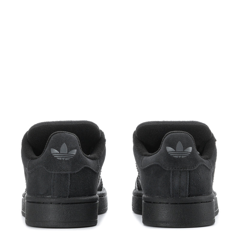 Black youth sneakers with heel view and trefoil logo on the back