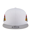 White snapback cap with gray brim and side logo accents in red and yellow