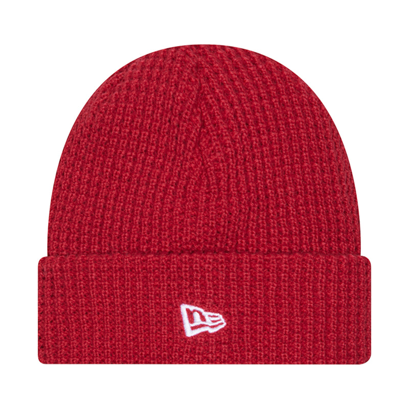 Red knit waffle beanie with New Era logo patch on front cuff