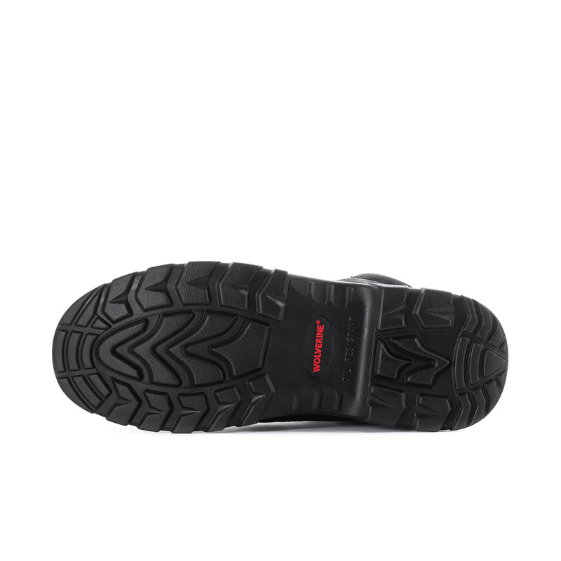 Black textured rubber outsole with deep tread and small red logo patch