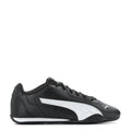 Youth black low-top sneaker with white PUMA formstrip and lace-up front