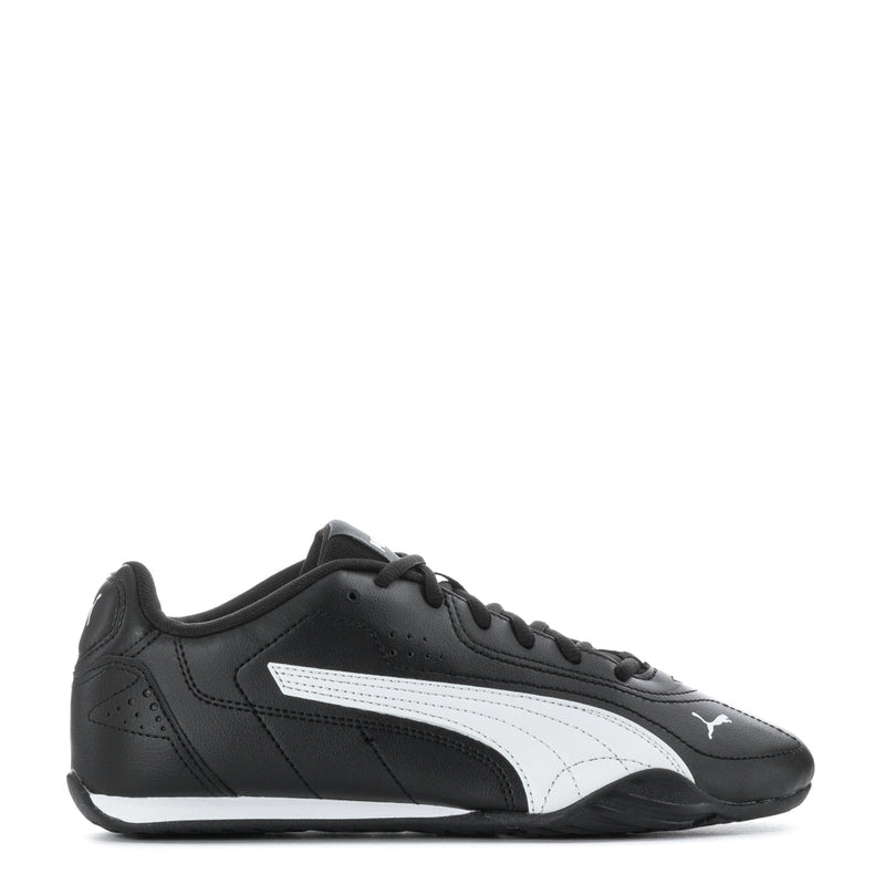 Youth black low-top sneaker with white PUMA formstrip and lace-up front