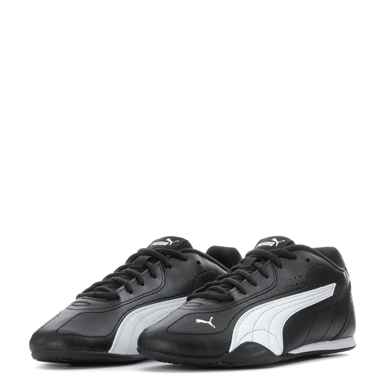 Youth black low-top sneakers with white stripes and PUMA logos, lace-up