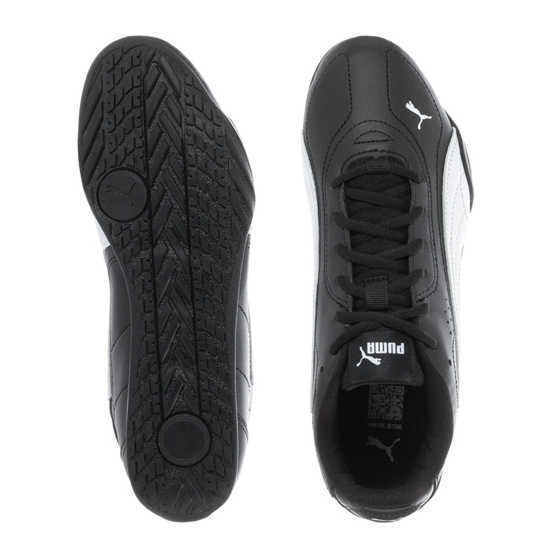 Youth sneaker outsoles and inner view, black upper with laces and PUMA logo