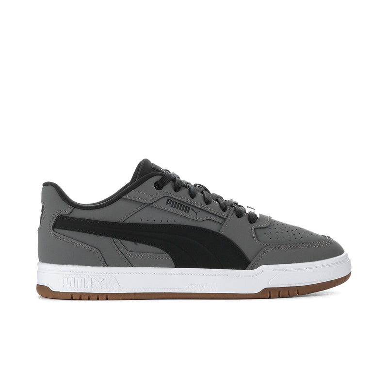 Men's Puma Caven III low-top sneakers in dark gray, black, and white with gum sole.