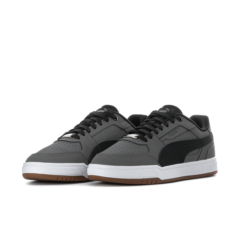 Men's Puma Caven III low-top sneakers, dark gray uppers with black logo and white midsole.