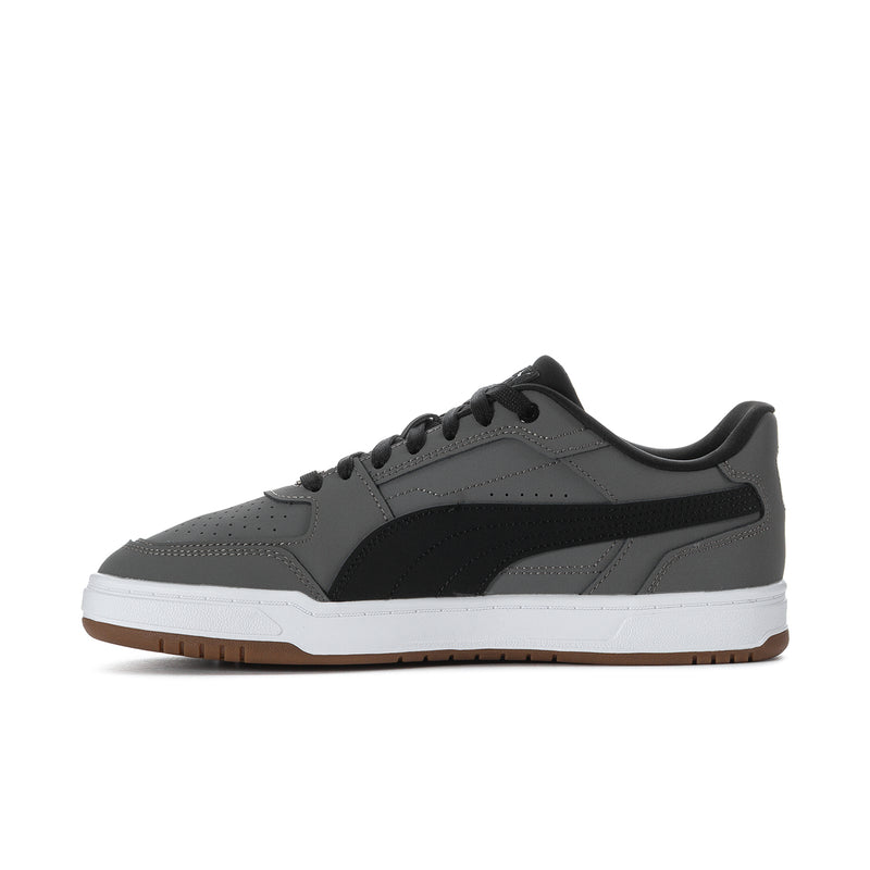 Men's Puma Caven III low-top sneakers, perforated toe, black side panel, gum outsole.