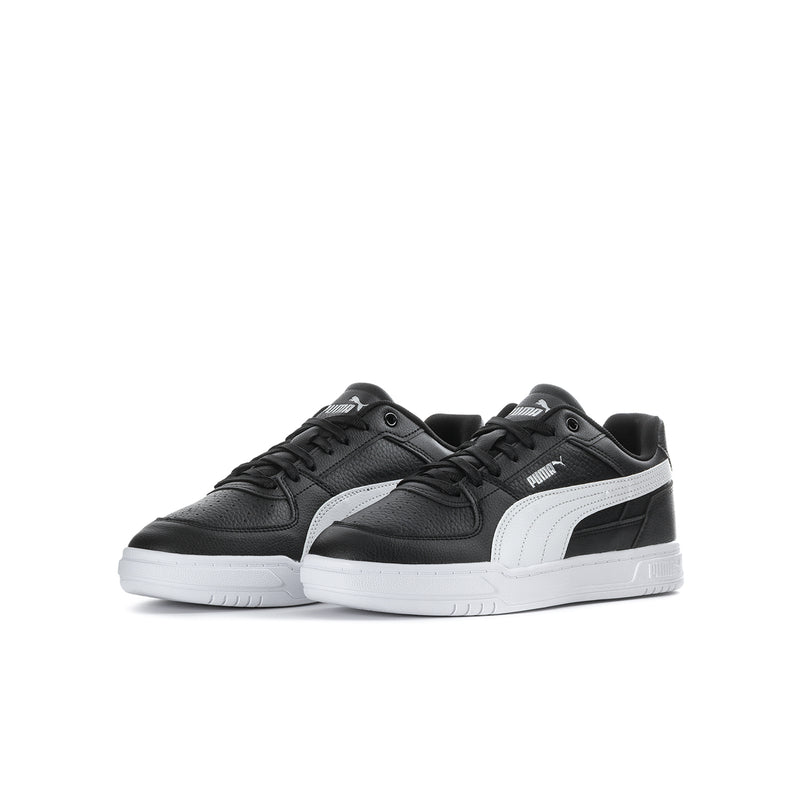 Kids' black and white Puma sneakers, side view with white Formstrip