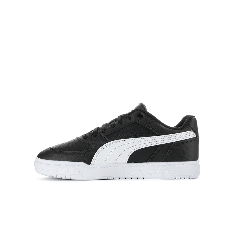 Kids' black and white low-top Puma sneaker, front 3/4 view