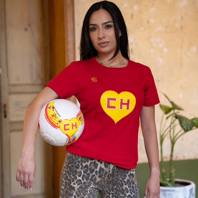 White soccer ball with red-yellow designs and yellow 'EH' heart on front