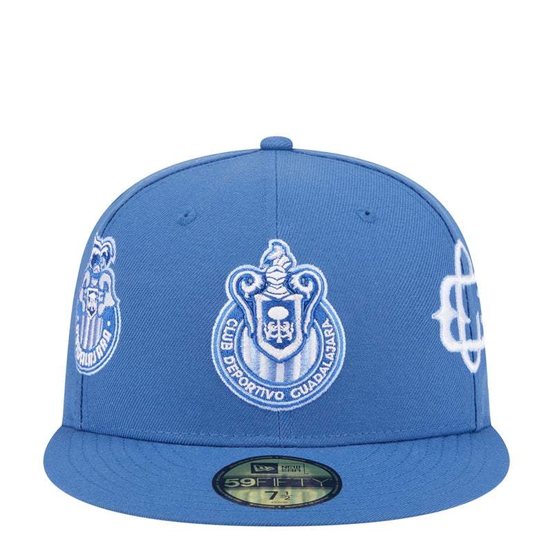 Blue baseball cap with front crest and side logo patches