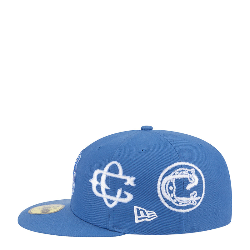 Blue baseball cap with large front league logo and side crest emblem