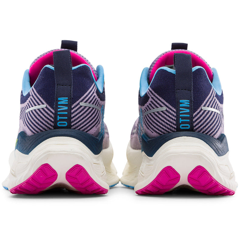 Pair of blue and pink athletic shoes on a white background