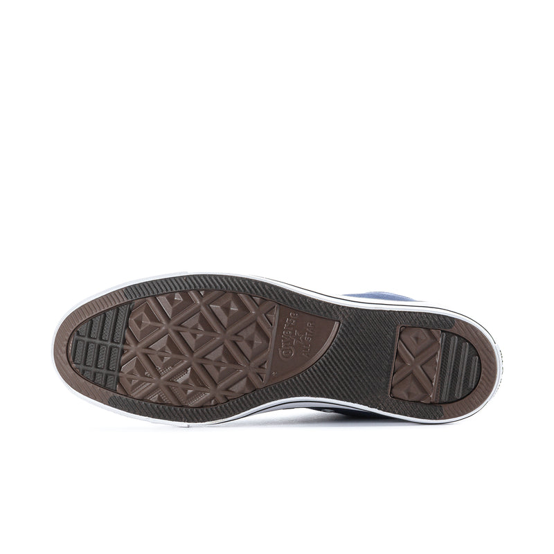 Navy high-top sneaker outsole with patterned rubber tread and white midsole edge