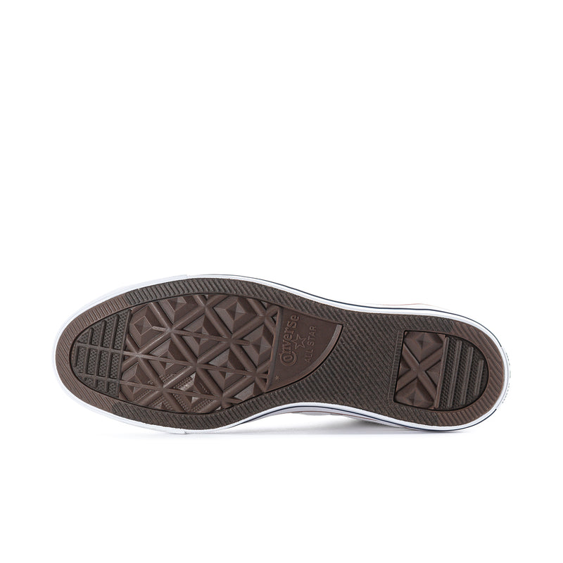 Rubber outsole for a white high-top sneaker with textured diamond tread