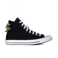 Black high-top sneakers with white laces and leopard bow on the side