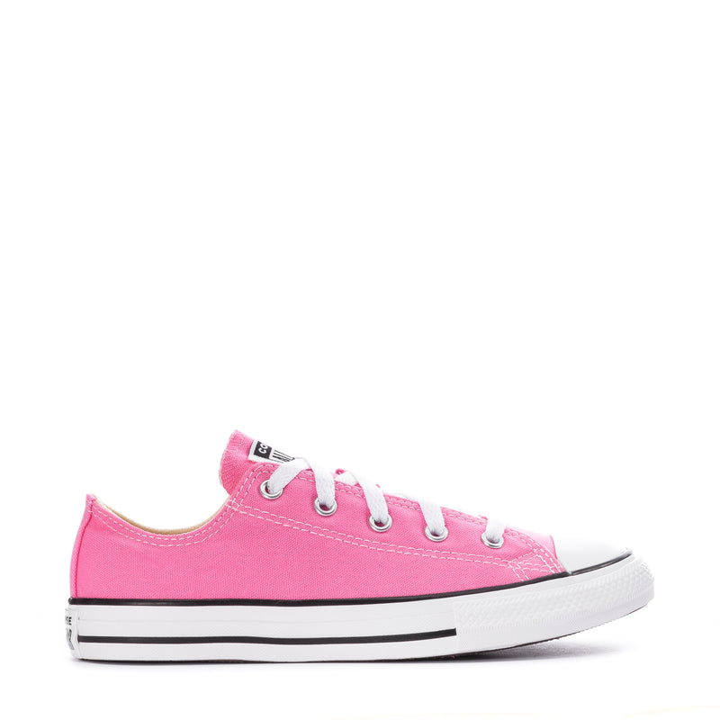Pink kids low-top canvas sneakers with lace-up front and rubber toe cap.