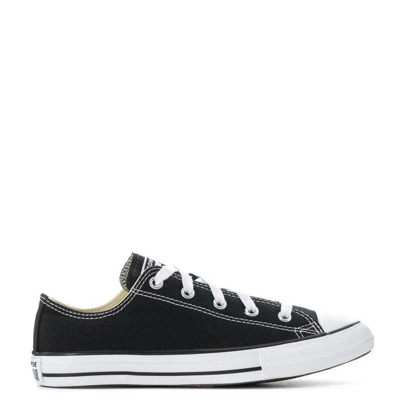 Kids black low-top sneakers with white rubber sole, lace-up front, canvas upper