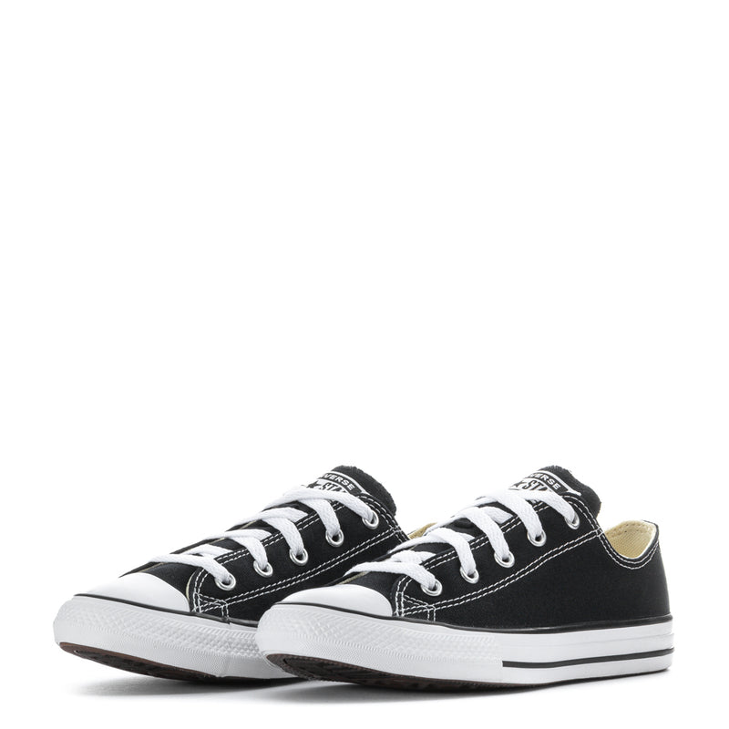 Kids black low-top sneakers pair view, canvas upper with white rubber toe caps