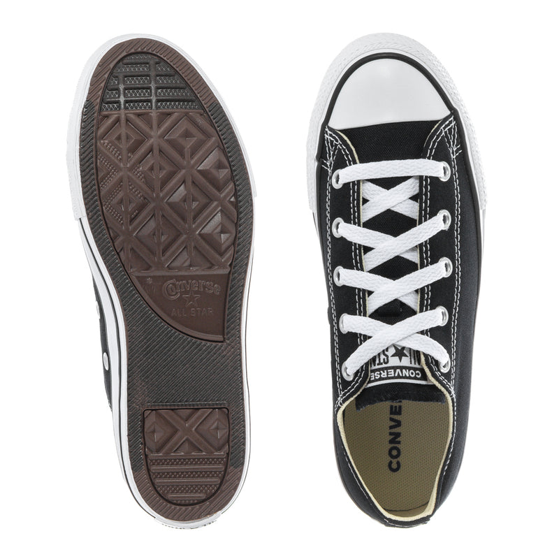 Kids black low-top sneaker outsole and heel, white midsole and lace-up upper