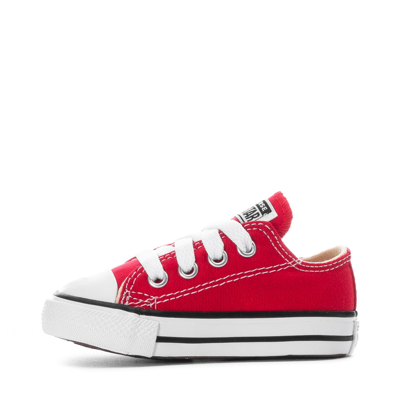Toddler red canvas low-top sneakers with white laces and white rubber midsole