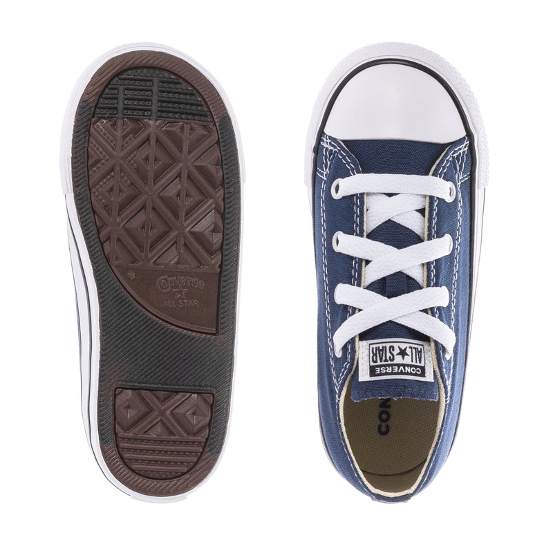 Navy toddler Chuck Taylor ox sneakers, outsole and tongue view with white laces