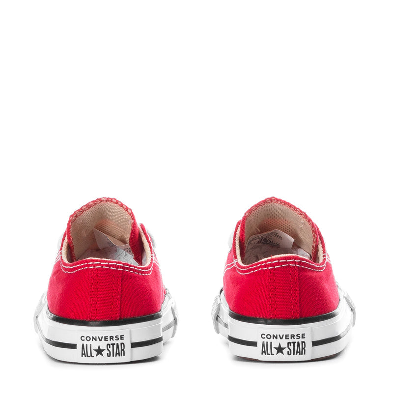 Toddler red canvas sneakers with Converse All Star logo on heel and white sole