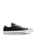 Youth black canvas low-top sneakers with white laces and rubber toe cap