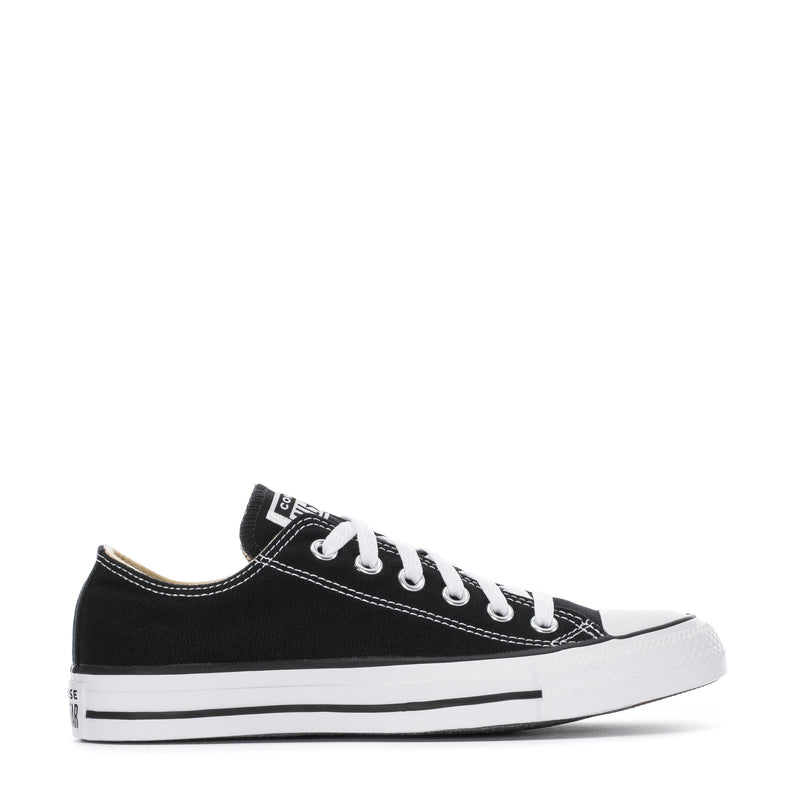 Youth black canvas low-top sneakers with white laces and rubber toe cap