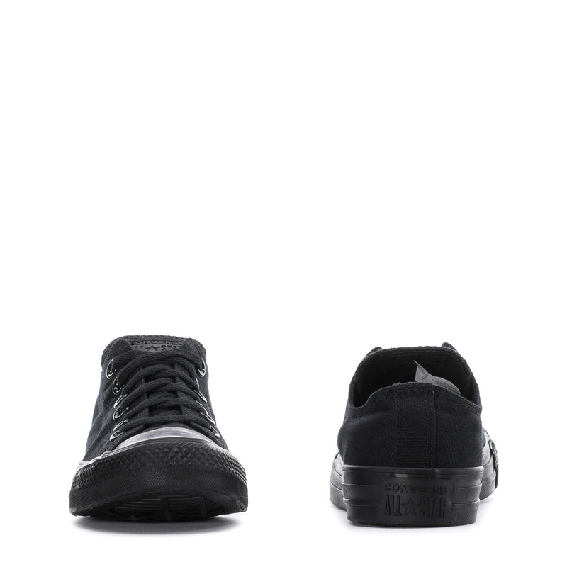 Youth Chuck Taylor All Star ox sneakers, black pair heels with rear logo and stitching