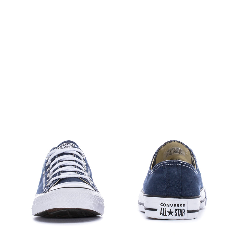 Youth navy canvas ox sneaker pair views; CONVERSE All Star logo on heel