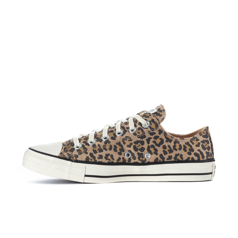 Leopard-print canvas low-top sneakers with lace-up, white midsole and rubber toe cap
