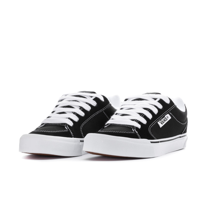 Pair of men's Vans chukka push sneakers, black uppers with white laces and white sole