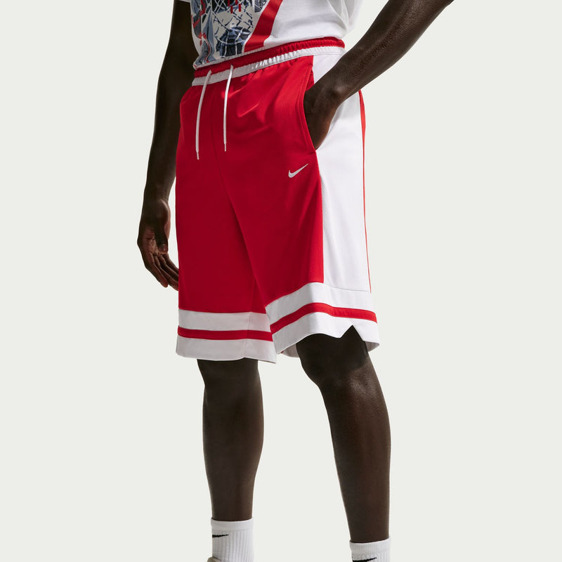 Red and white basketball shorts with drawstring, striped hem, and Nike swoosh