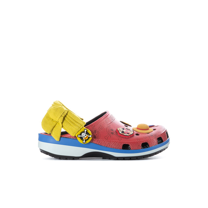 Kids red clog with yellow strap, blue sole, and cartoon character patch on top
