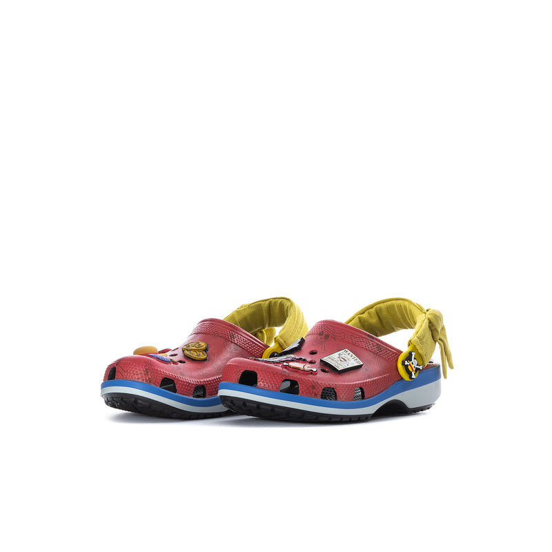 Kids red clog pair with yellow straps, blue sole, and playful graphic decorations