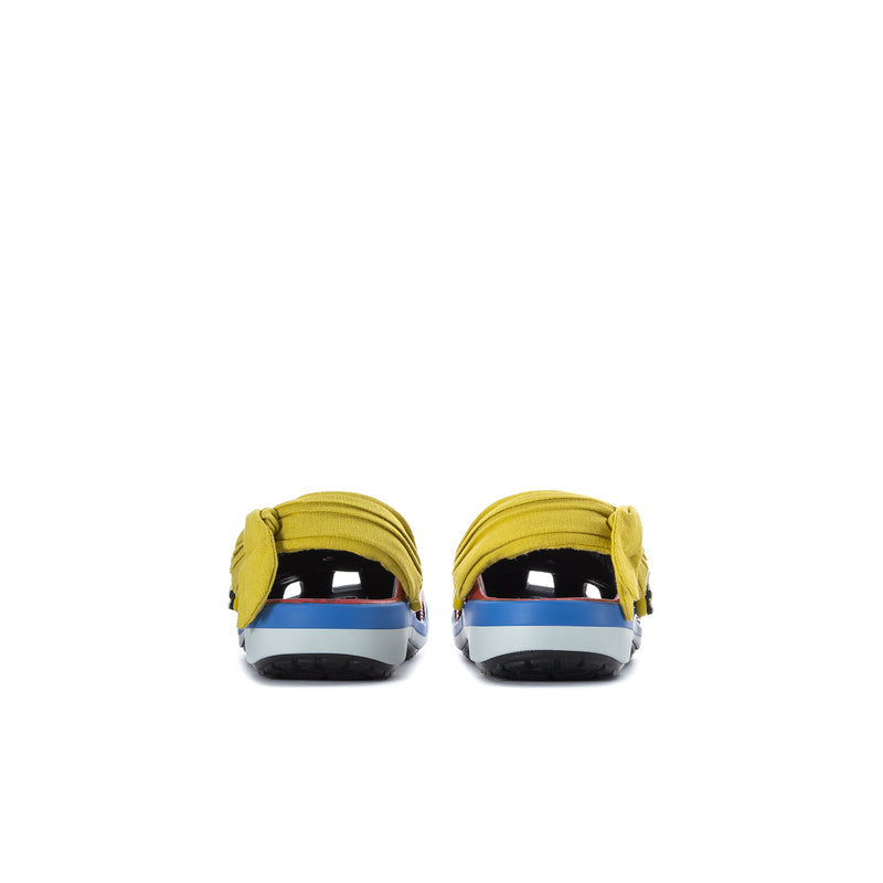 Kids clog with yellow heel strap and blue-striped sole, red upper with character details